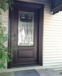 Double fiberglass front doors with sidelites on a Toronto home