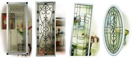 Decorative door lite with wrought iron style glass and caming for fiberglass entry doors